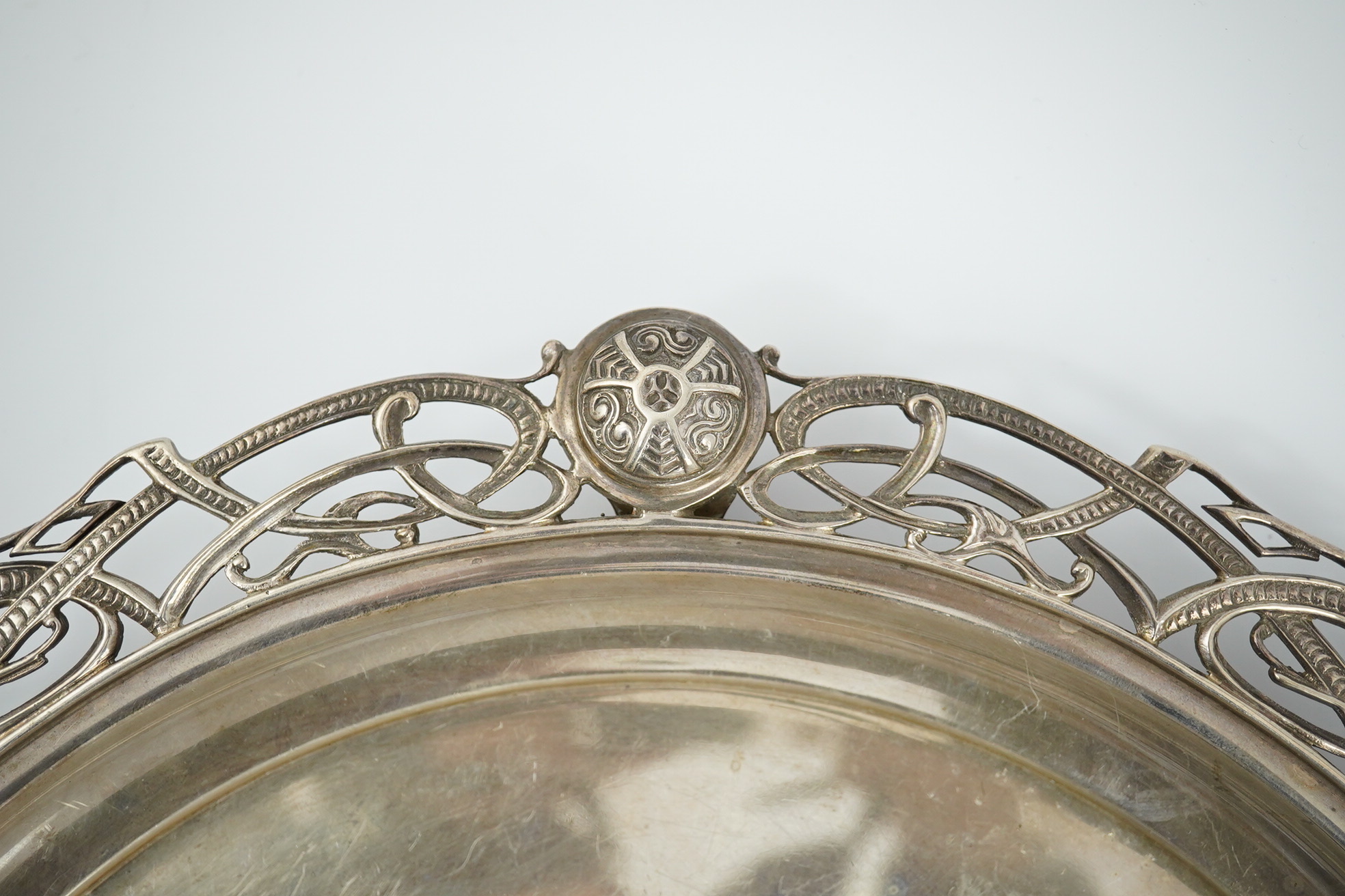 A George V silver salver with pierced Celtic border, by Atkin Brothers